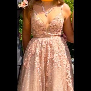 Stunning rose gold Jovani gown. Gorgeous beading throughout. Size 0. $375